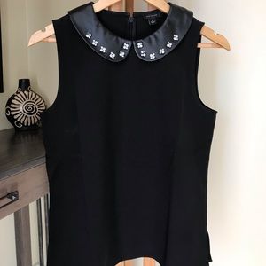 Any Taylor sleeveless top with leather collar